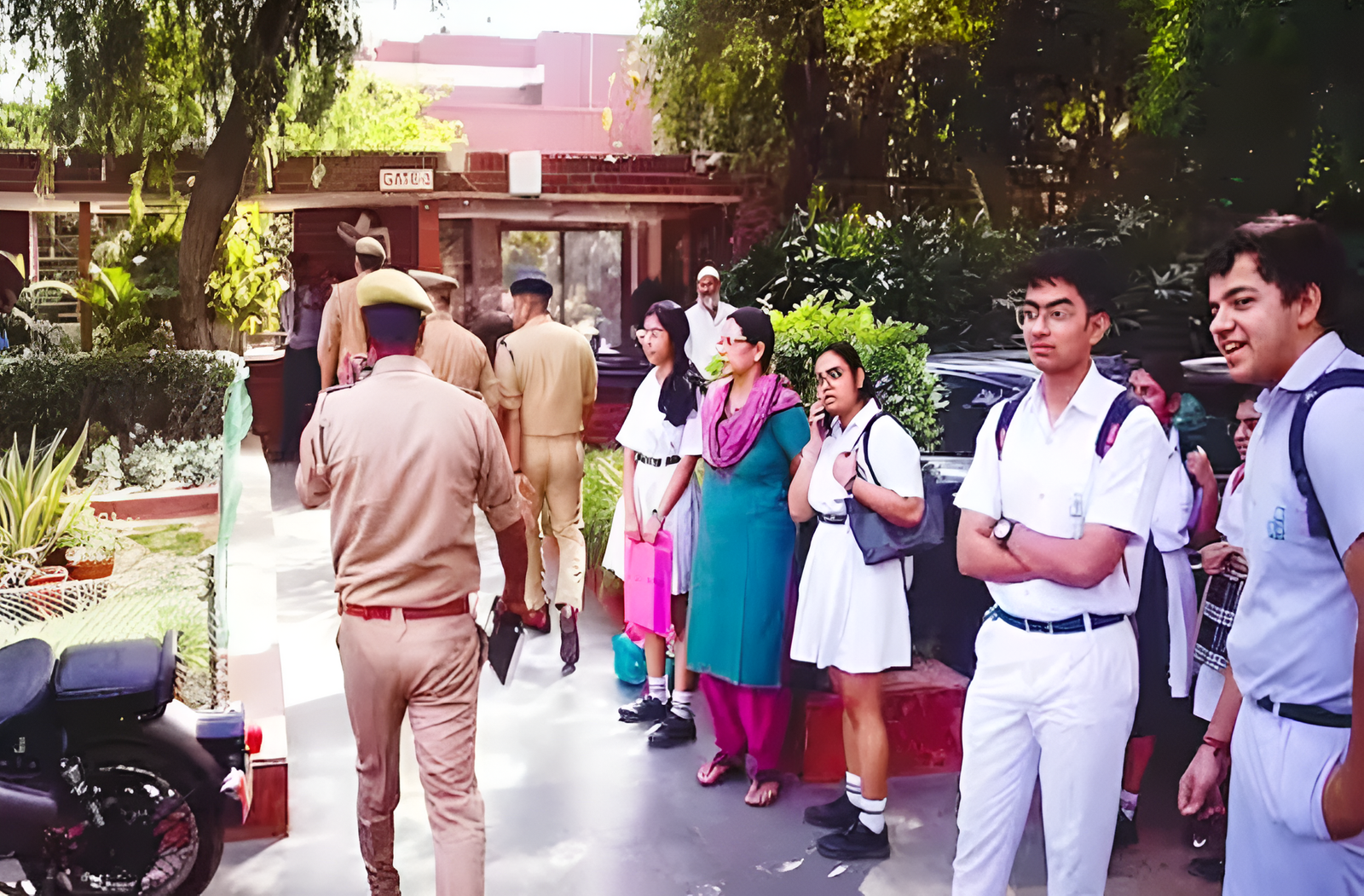 Delhi Police and Bomb Disposal Squad conducting search at a school in Delhi after bomb threat email.